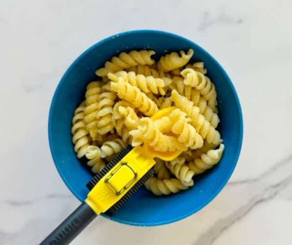 nutritional yeast on buttered noodles